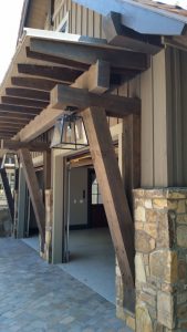 Custom wood beams highlight this living room - High Mountain Millwork Company, Franklin, NC
